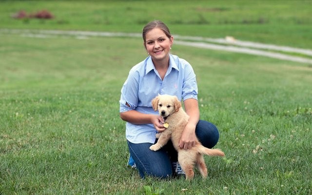 Teen With Her Own Dog Training Business Writes Book to Help Dog Owners