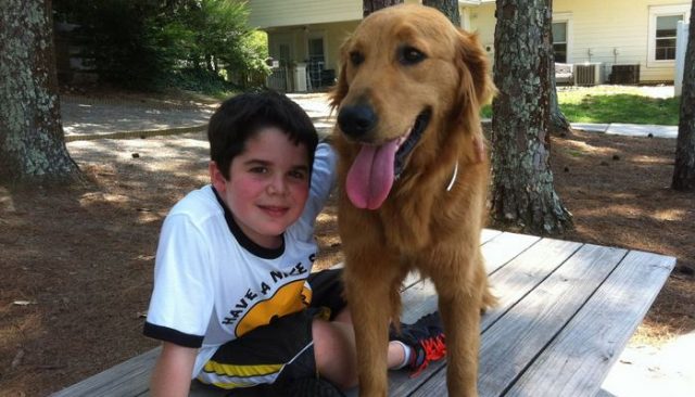 Boy and Dog Forever Immortalized in Pages of Yearbook