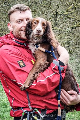 dog rescued after falling