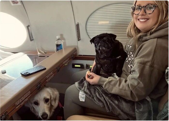 Maddie Young is traveling with her dog