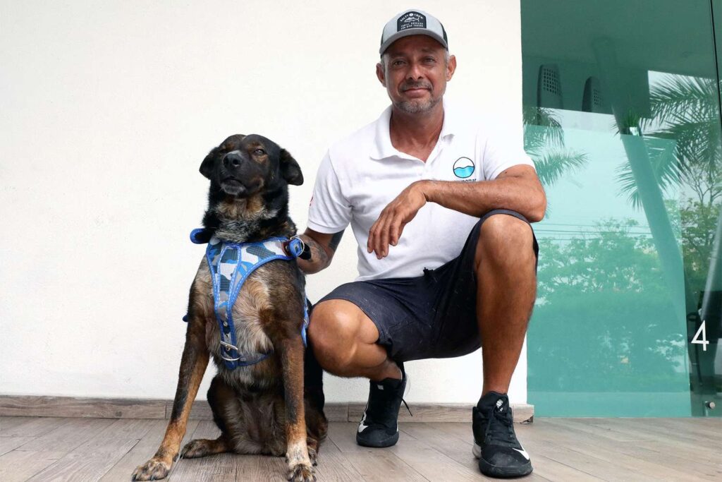 Genaro Rosales, 48, a member of the rescue crew, will be adopting Bella (Photo by ULISES RUIZ)