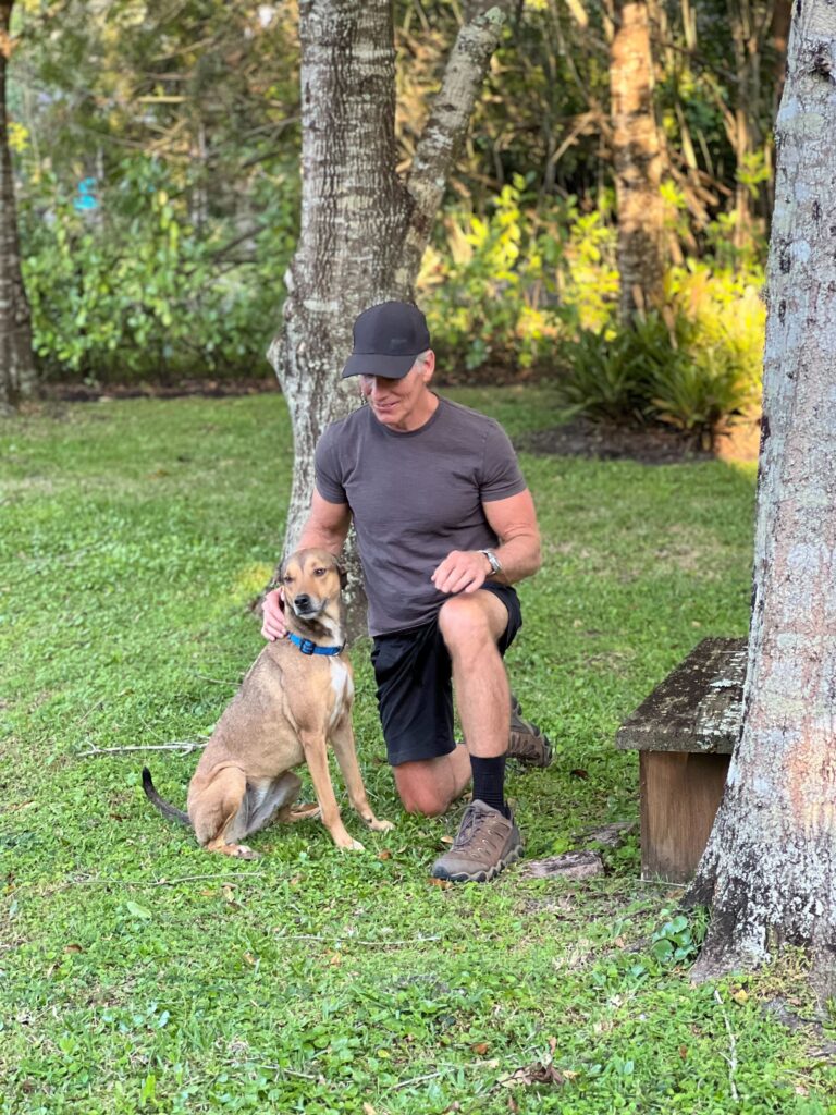 Dave and his dog, Sasha, outdoors